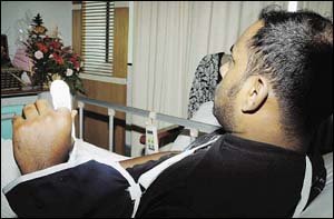 CRUEL ACT: Kumaran showing what is left of his left index finger. — NST picture by Mohd Said Samad.